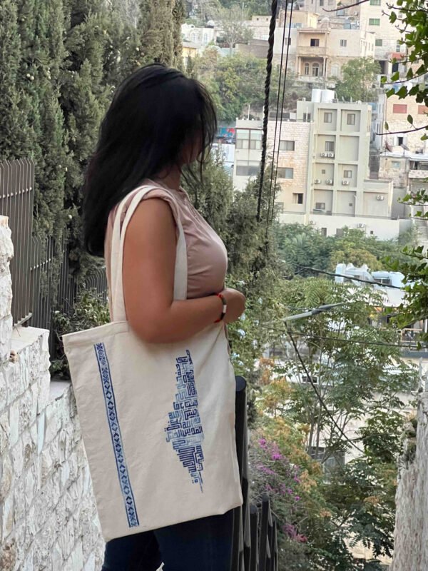 Beige tote with blue Palestine map embroidery