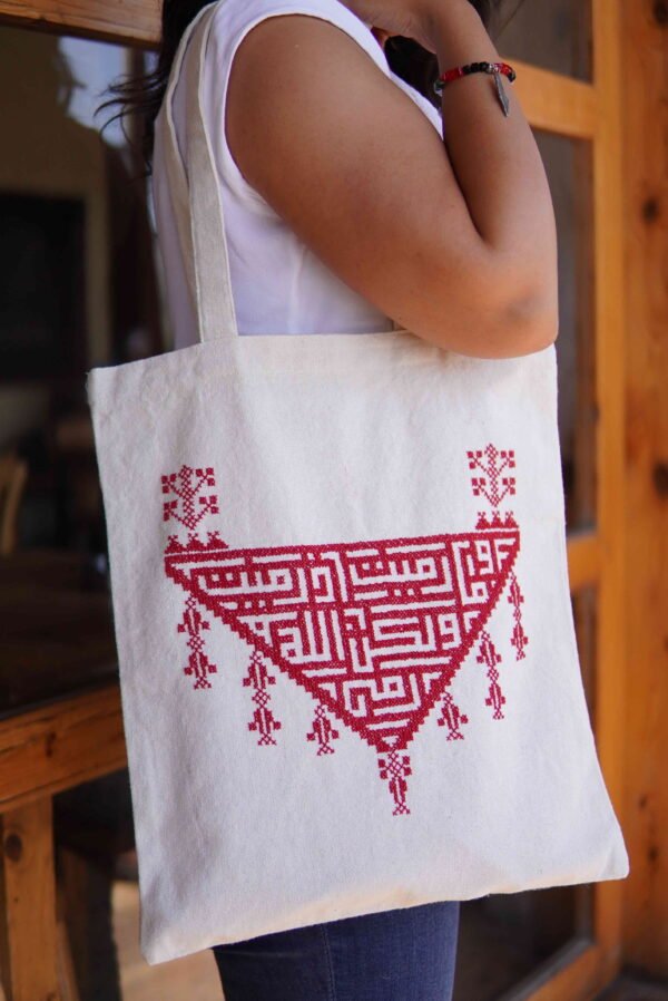 Beige tote bag with burgundy triangle embroidery
